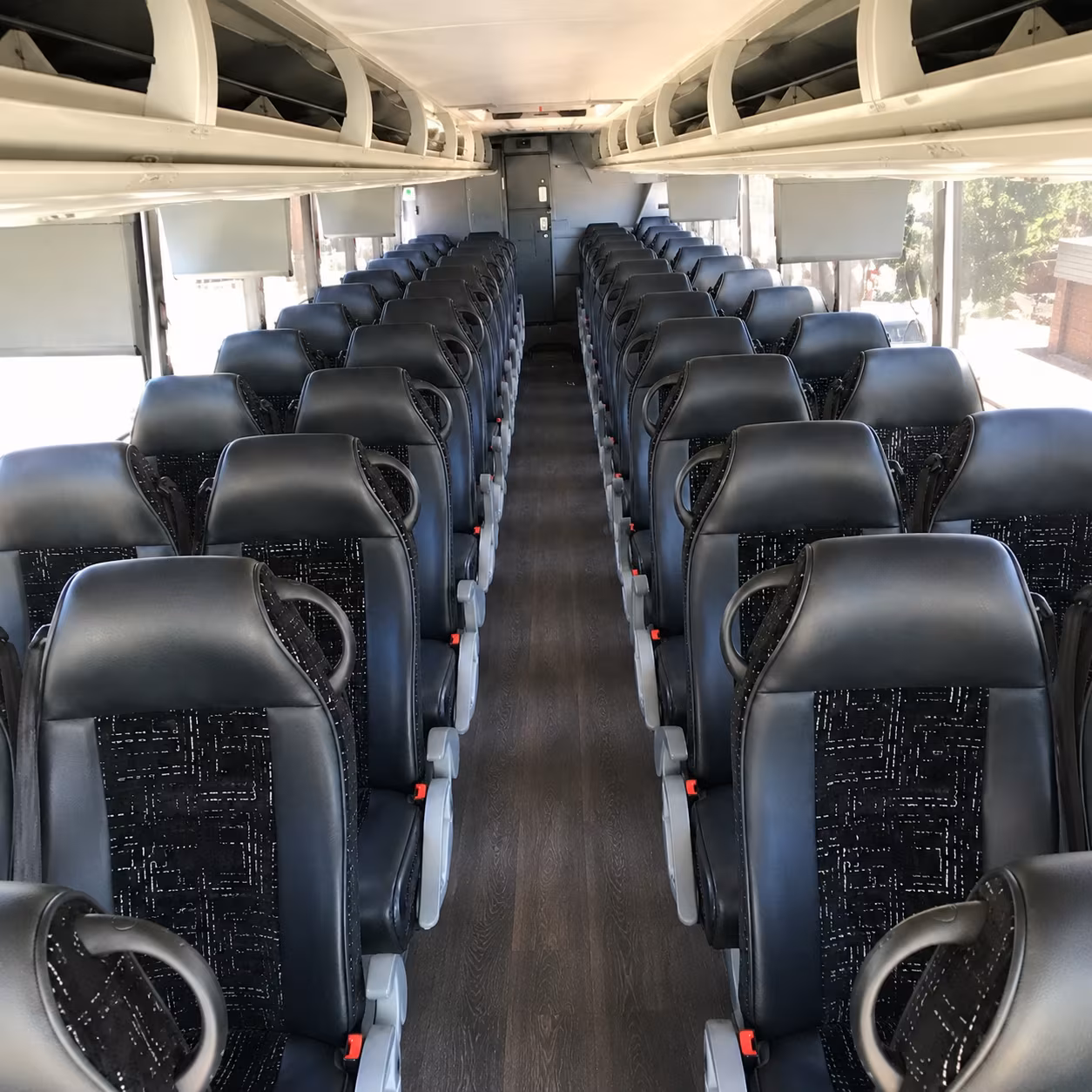 rochester 56 passenger charter bus inside